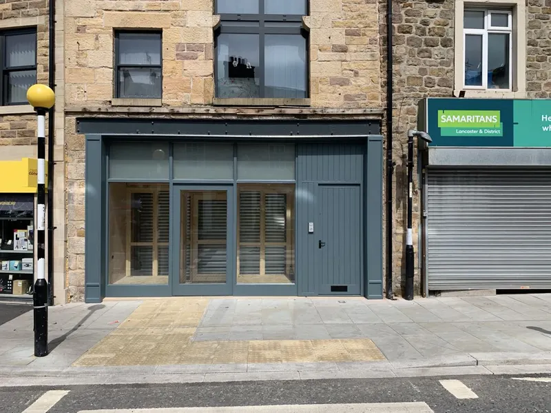 Commercial office fit-out with bespoke joinery and tiled kitchen area in Blackpool